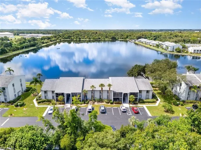 Aerial view of the lake.  Unit #12 is in front of the red car on the second floor.