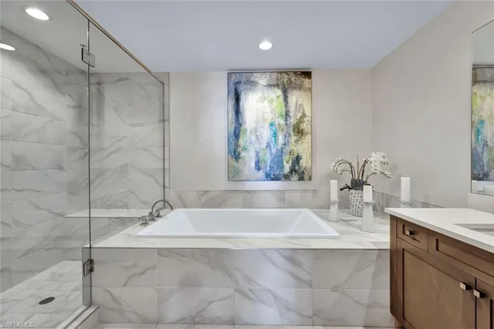 Spacious shower and a soaking tub rivaling any spa!
