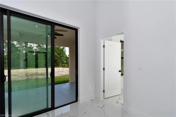 Entryway featuring ceiling fan