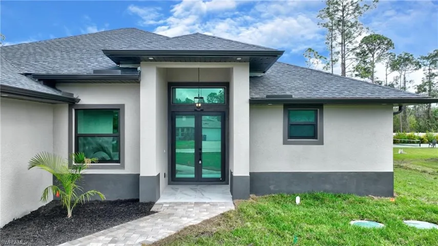 Entrance to property featuring french doors