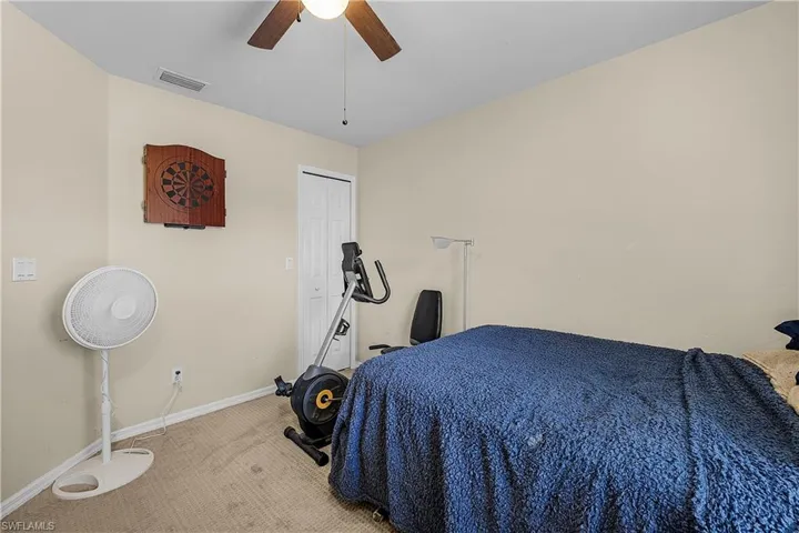 Bedroom with carpet floors and ceiling fan