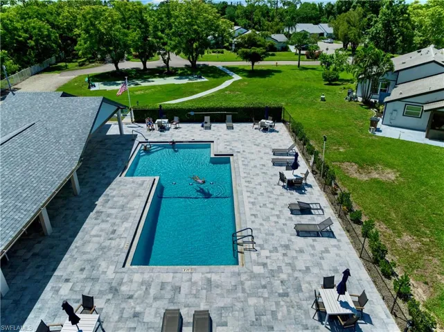 Community pool featuring a patio area