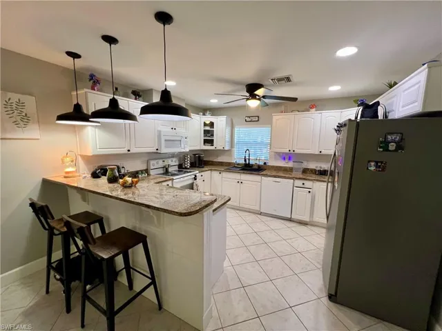 415  Jackson  AVE, Lehigh Acres, FL 33972