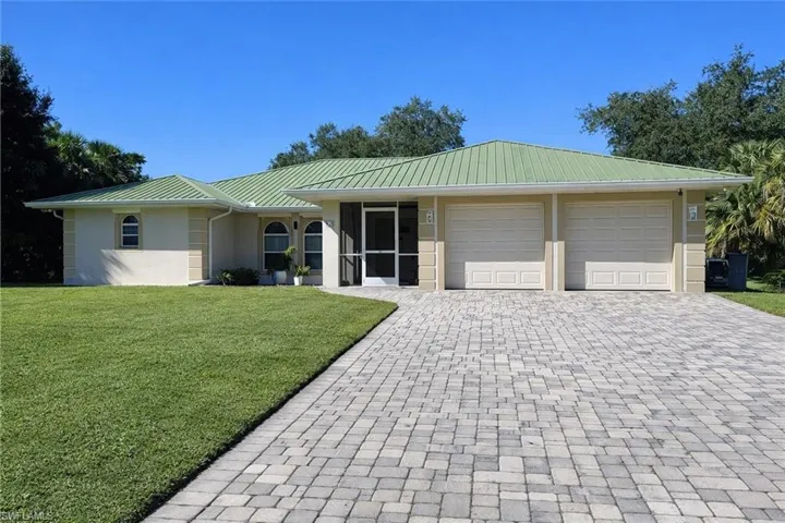 415  Jackson  AVE, Lehigh Acres, FL 33972