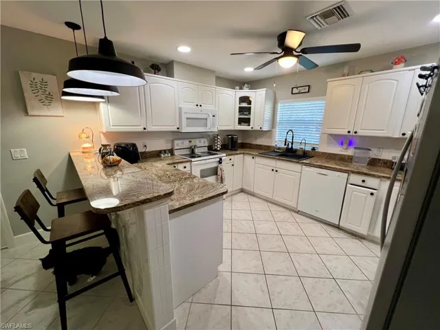 415  Jackson  AVE, Lehigh Acres, FL 33972