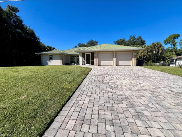 415  Jackson  AVE, Lehigh Acres, FL 33972