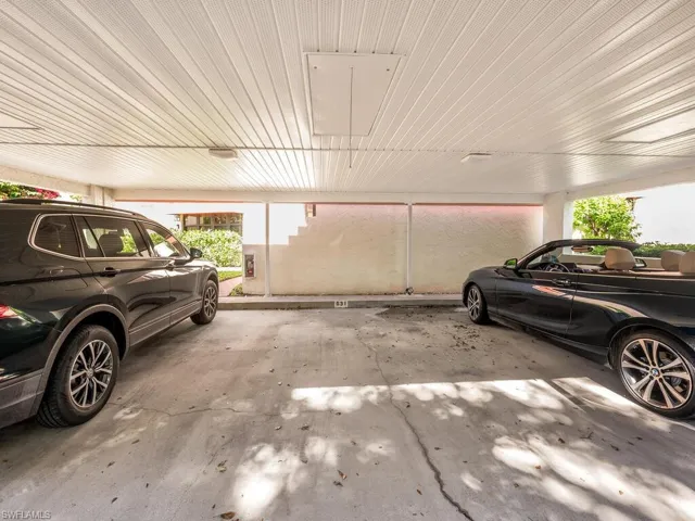 Covered Parking with storage space above and plenty of Guest Parking spaces nearby