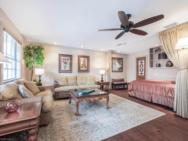 Downstairs Primary Bedroom offers space galore with living area