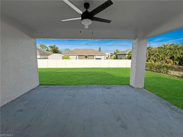 View of patio featuring ceiling fan