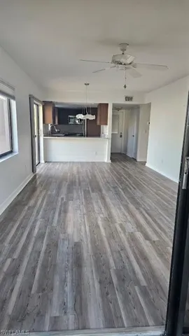 Bedroom with wood finished floors