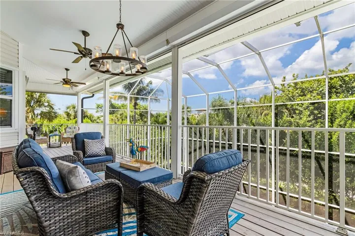 Sunroom / solarium featuring an outdoor living space, plenty of natural light, and ceiling fan
