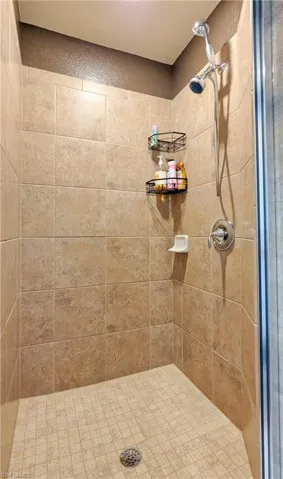 Full bath featuring a stall shower