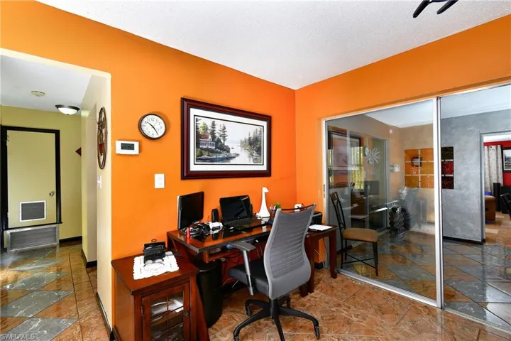 Office featuring a textured ceiling