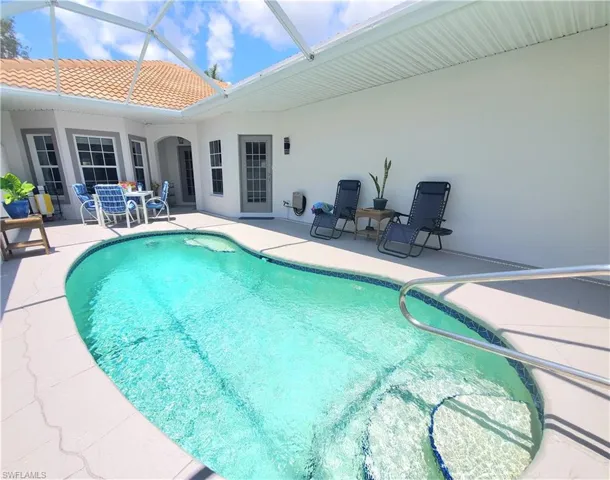 Pool and lanai, large under roof sitting areas