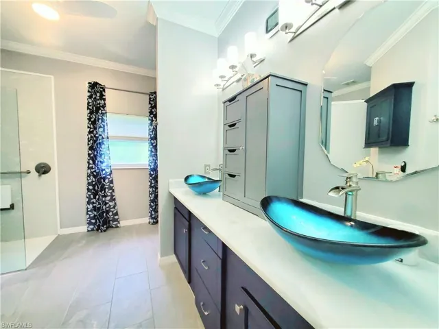 Updated modern sinks, custom vanity, moldings