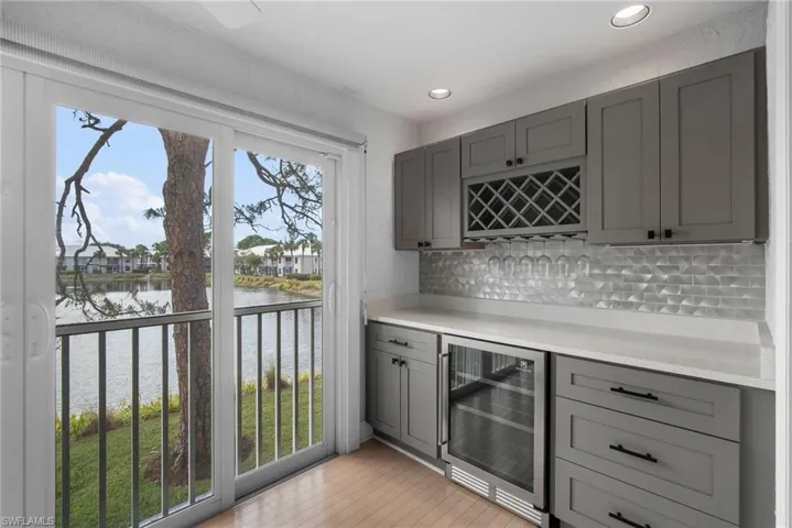 Extended Living Area with Hurricane Sliders that open to screened, outdoor breezes.