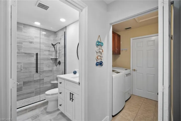 Guest Bath and entry to in-unit laundry