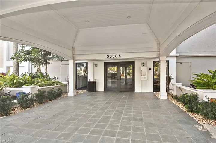 Entrance to property with french doors and stucco siding