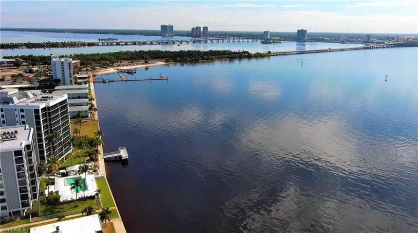 Bird's eye view of a nearby body of water and a notable bridge
