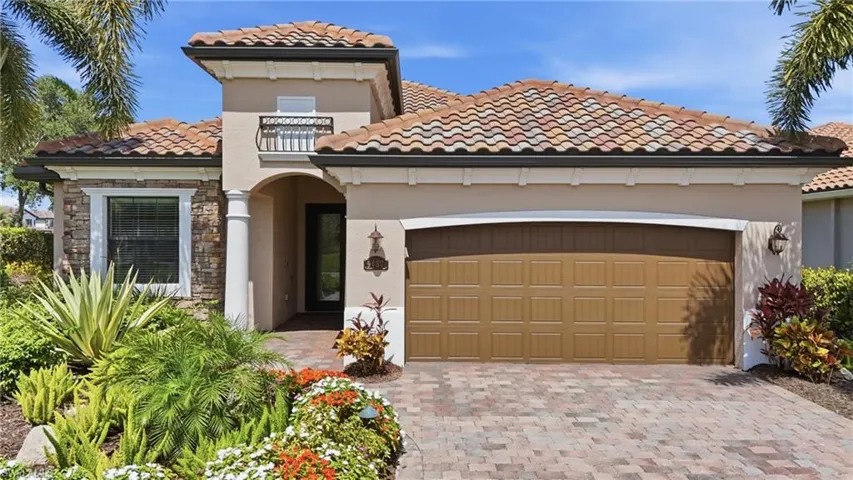 Charming Ranch style home with lush landscaping everywhere you look