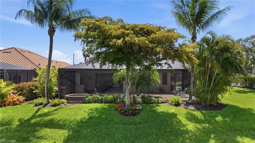 Well manicured landscaping which provides a lot of privacy for this home, which feels like the lot is so much bigger!