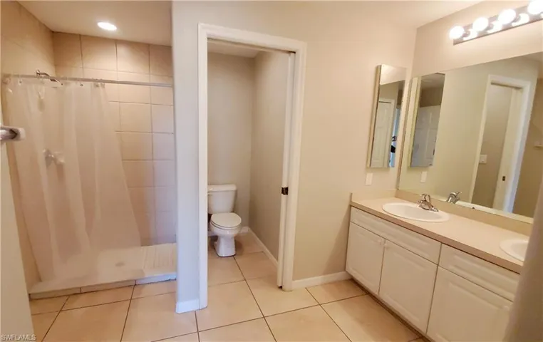 Master bathroom with shower and double sink