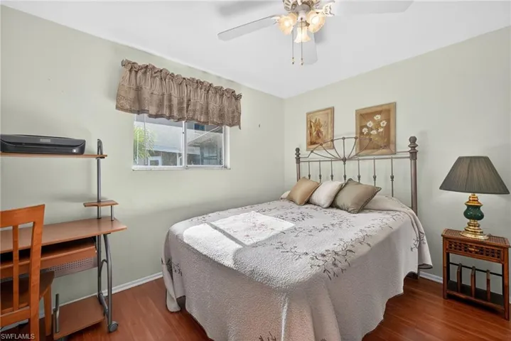 Guest Bedroom with Laminate Flooring