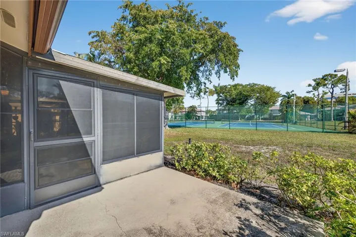 Private Entrance in Back of Property with views of the Tennis Courts