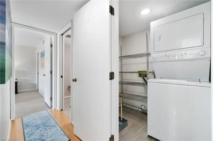 Hallway to guest bath and Primary bedroom