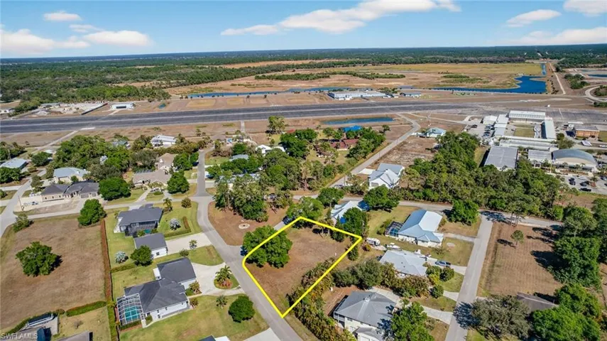 Aerial view of of your next airpark home and hangar! Access to FL59 at the end of the road in front of property.