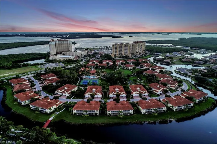 Aerial view at dusk of a water view and a city view