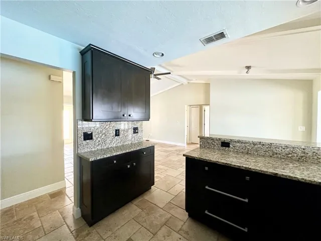 Open to Hallway Living & Dining Area