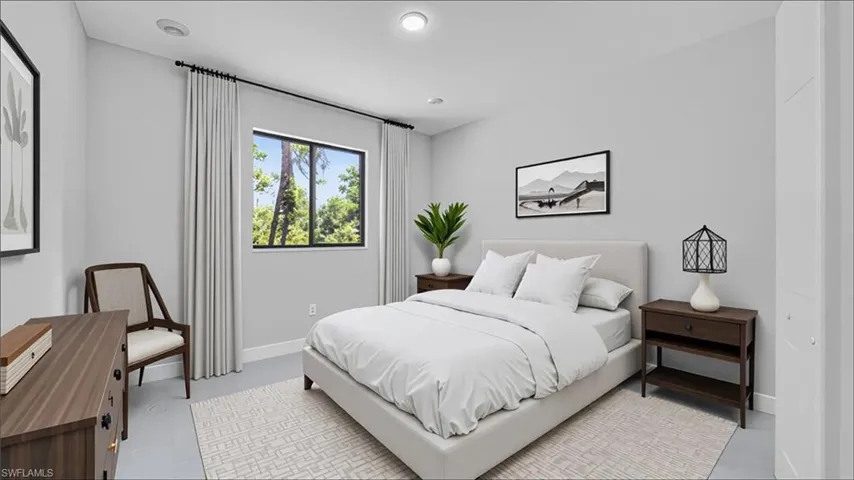 Bedroom featuring baseboards