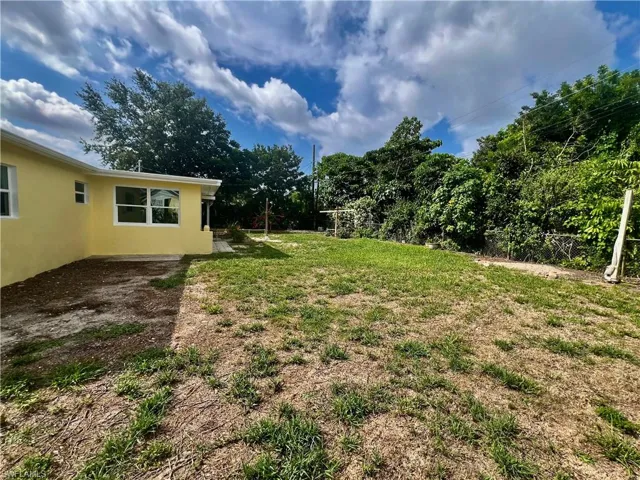 Nicely landscaped FENCED BACKYARD