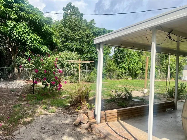 Nicely landscaped FENCED BACKYARD