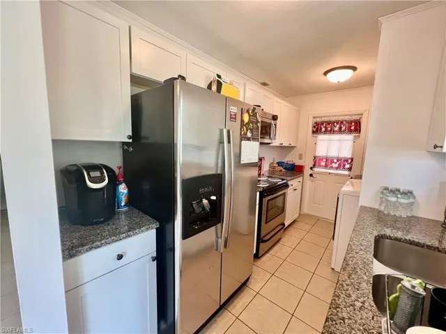 Granite tops and stainless steel appliances.