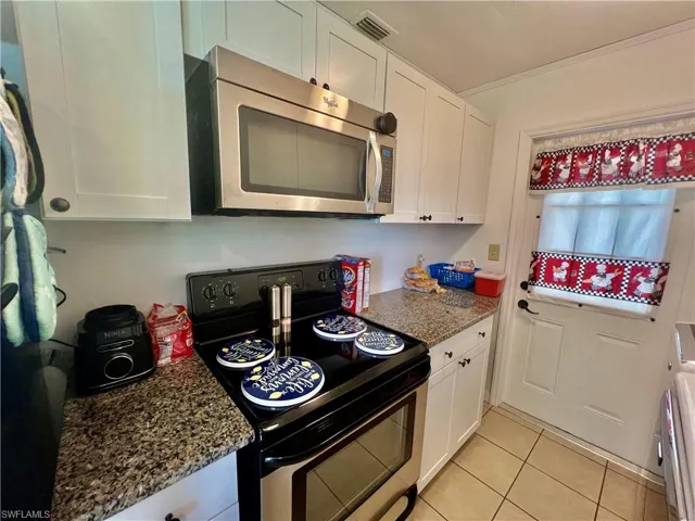 Granite tops and stainless steel appliances.