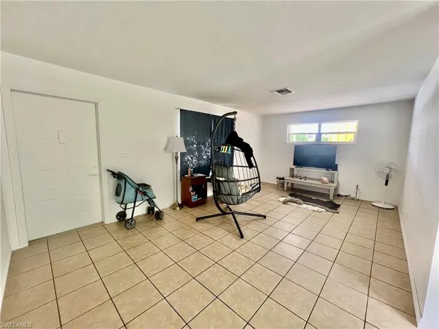 Ceramic tile floors throughout.