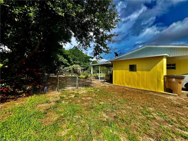 Side yard with double gate.