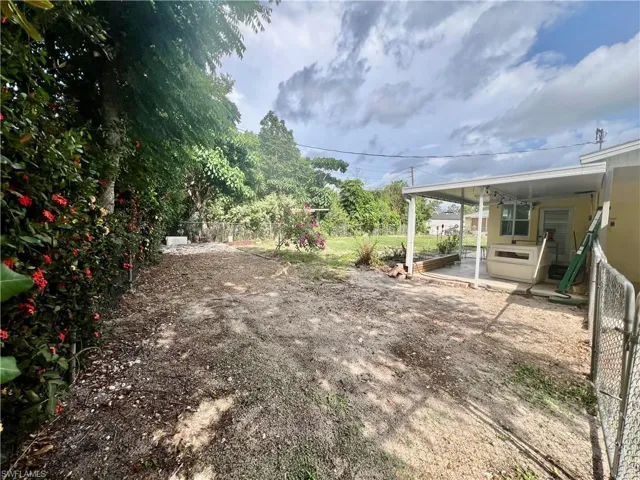 Nicely landscaped FENCED BACKYARD