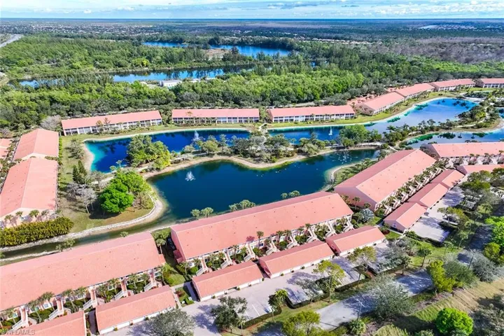 Aerial overview of property's location featuring a large body of water
