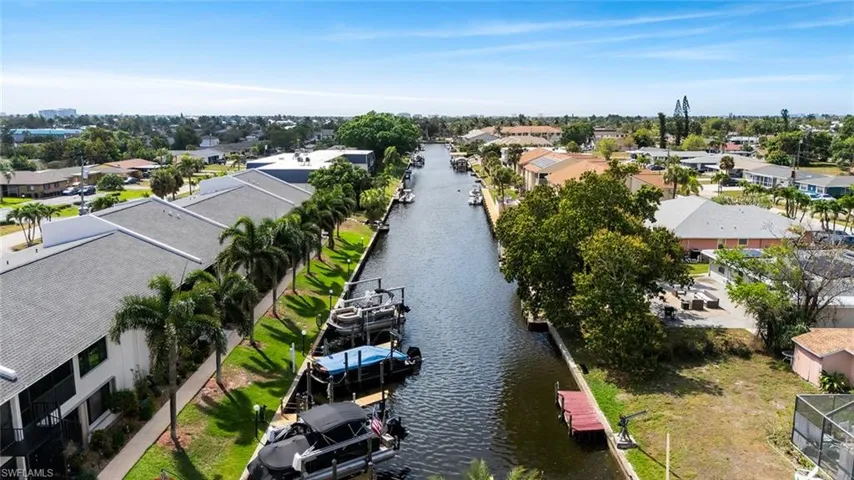 Aerial view of residential area with a nearby body of water