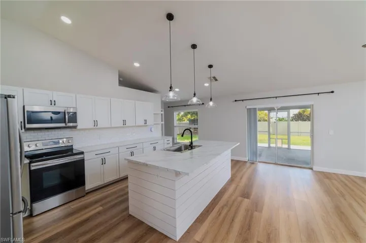 Completely renovated and updated kitchen with al stainless steel appliances