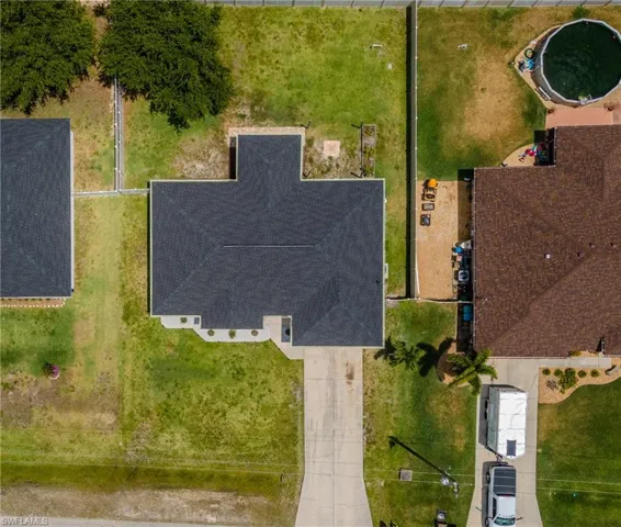 Brand new roof and 6" gutters all the way around.