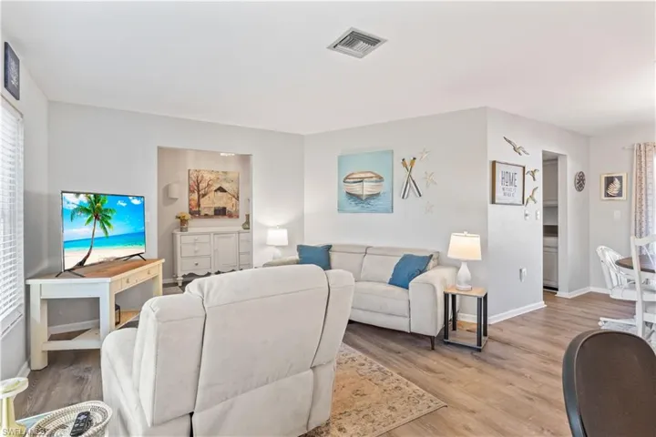 Large living space with easy flow to kitchen and dining areas.