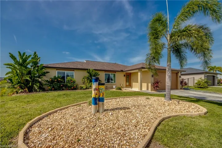 Charming ranch style home with 2 car garage & great curb appeal