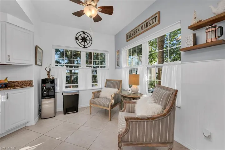 Sophisticated dining space with high ceilings and an effortless blend of comfort and elegance.