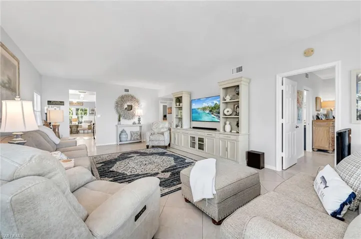 Spacious and inviting living area with stylish updates, natural light, and an open-concept design.