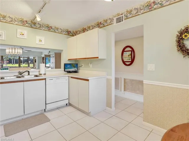 Kitchen with opening to the living area