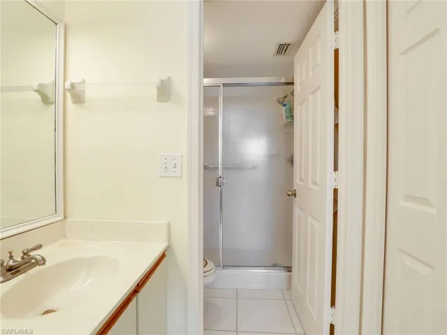 Doorway to walk in shower & toilet